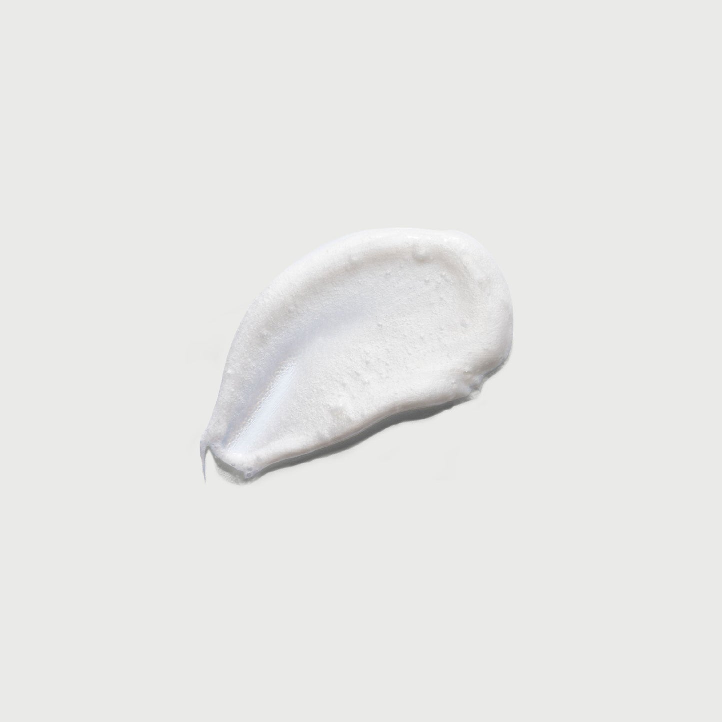 the-smoother-glycolic-acid-exfoliating-body-wash-i2 NATR-40002-Swatch-The-Smoother-Glycolic-Acid-Exfoliating-Body-Wash-bonebkgd.jpg