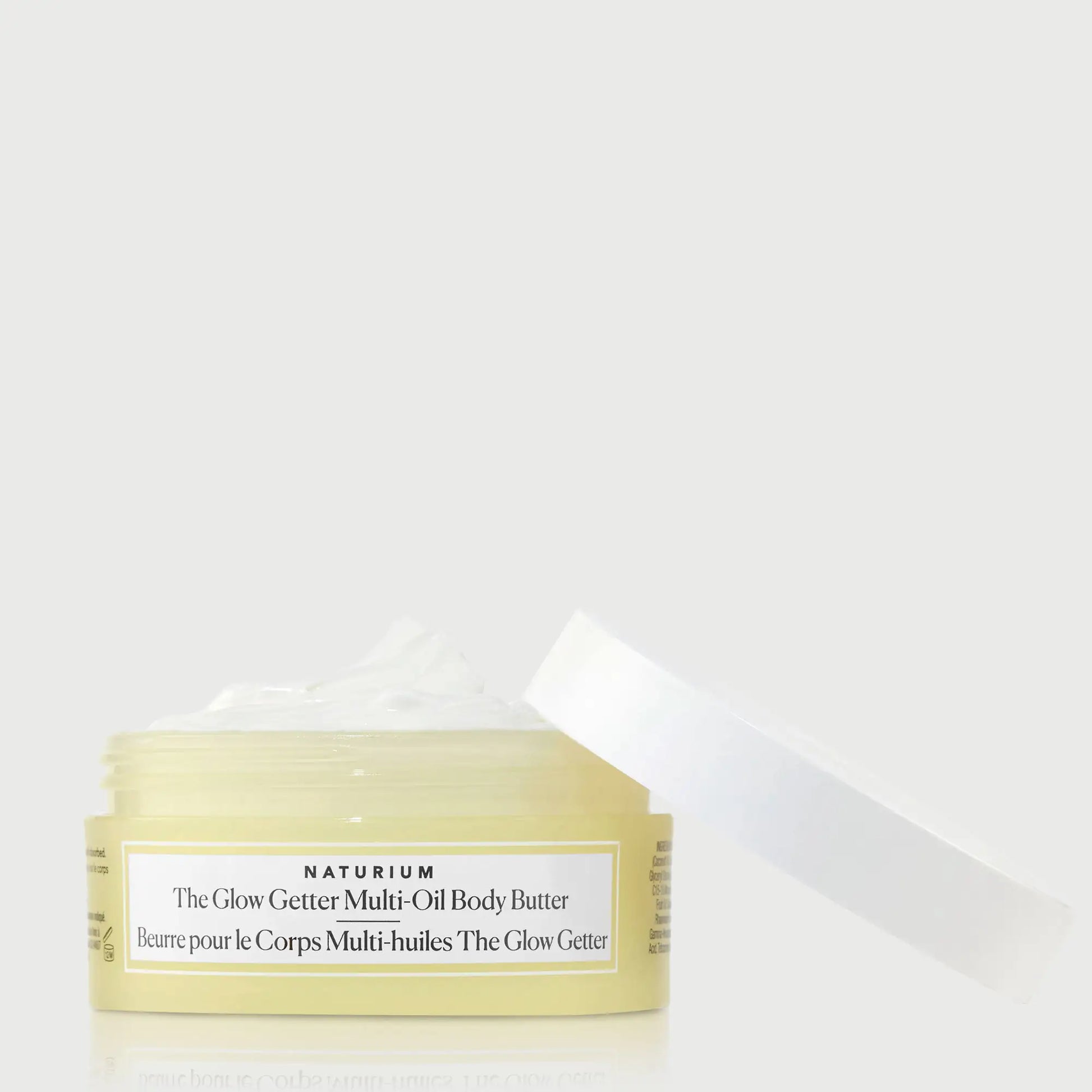 the-glow-getter-multi-oil-body-butter-travel-size-b5 NATR-40115_Glow-Getter-Body-Butter-Mini_front_capoff_bonebkgd.webp